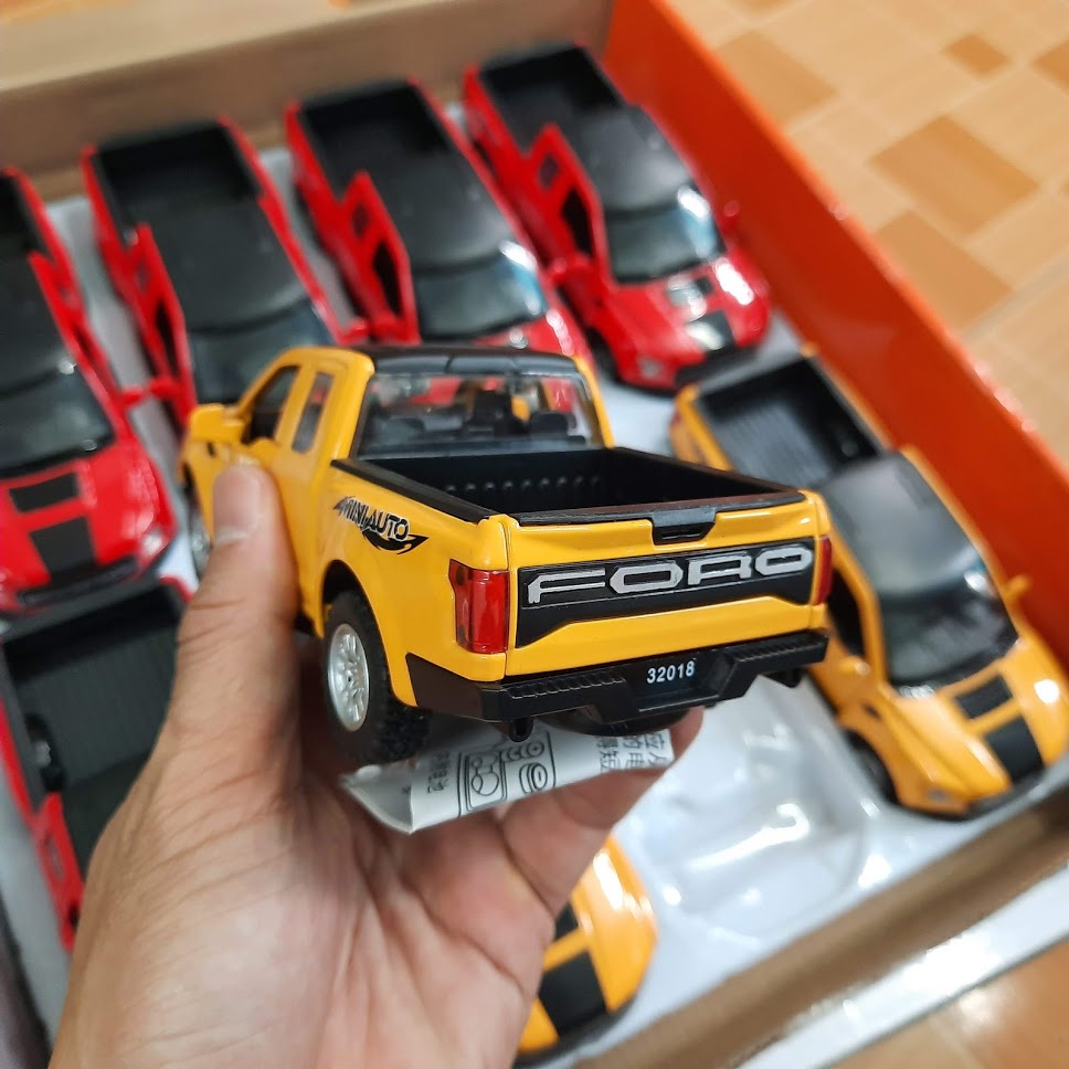Xe mô hình ô tô Ford F150 Raptor tỷ lệ 1:32 bằng sắt có âm thanh động cơ và đèn mở cửa xe đồ chơi trẻ em