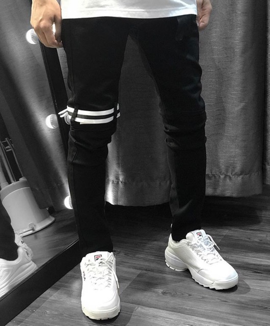Quần jeans đen phối dây và zip
