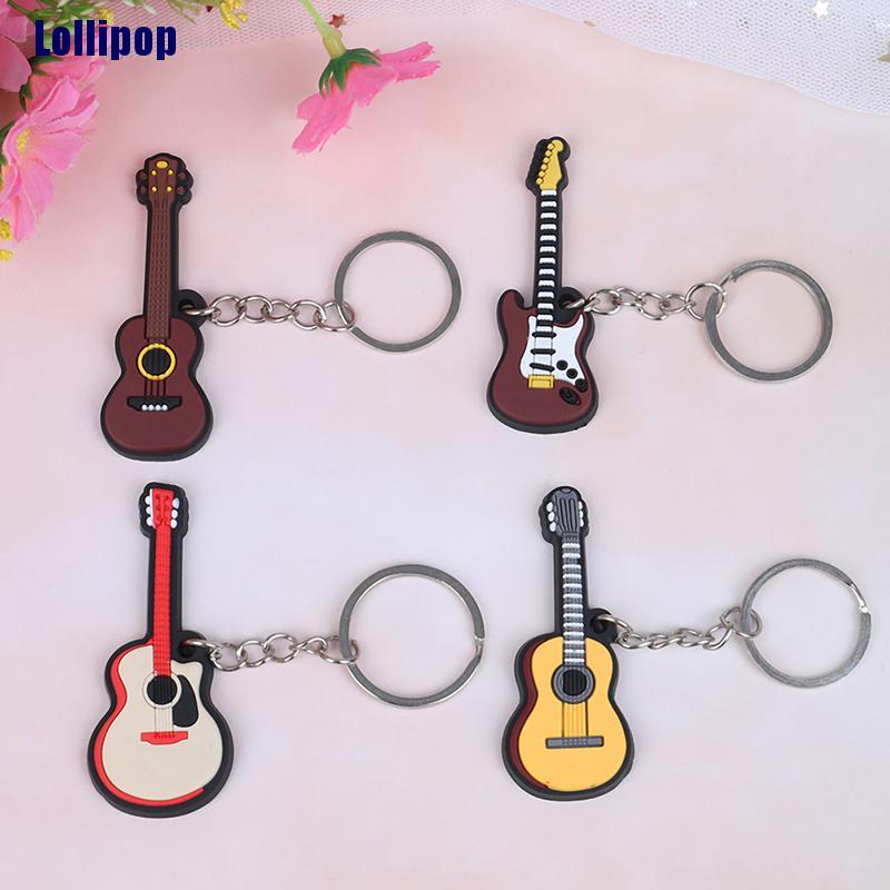 Set 2 Móc Chìa Khóa Bằng Silicon Mềm Hình Đàn Guitar / Ukulele / Điện Oikw