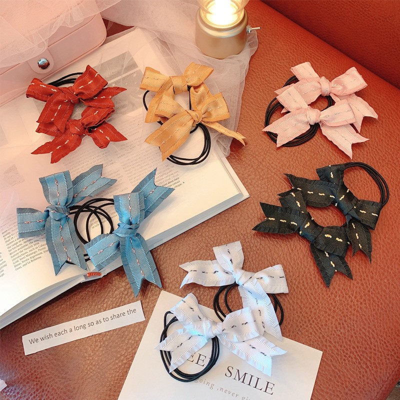 Dây buộc tóc hình nơ xinh xắn thời trang dành cho nữ