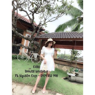 Đầm tay phồng nút bọc