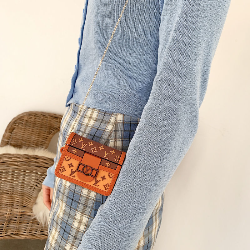 Vỏ silicone bảo vệ hộp sạc tai nghe thiết kế hình túi sang trọng và có dây đeo dạng xích thích hợp cho airpods 1/ 2 pro