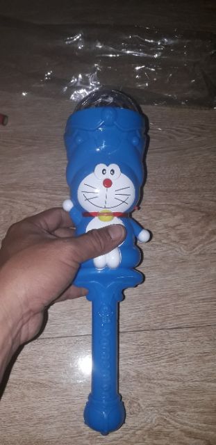 Giáng Sinh_Một cây đèn chơi Noel đoremoon có nhạc và đèn Led 7 màu quay tặng kèm pin