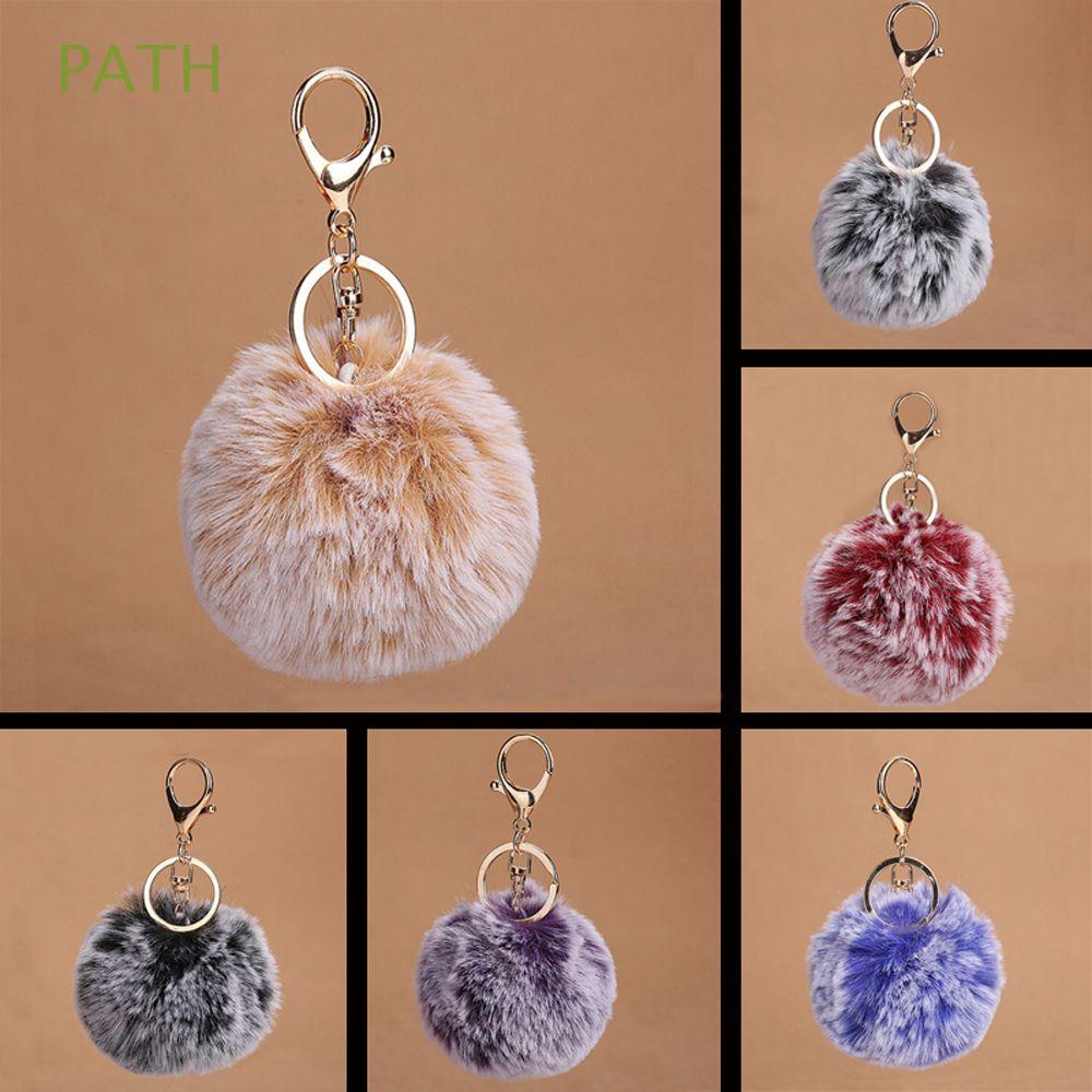 Móc khóa hình cục bông nhiều màu sắc dễ thương