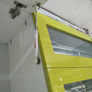 Pittong nâng cánh tủ