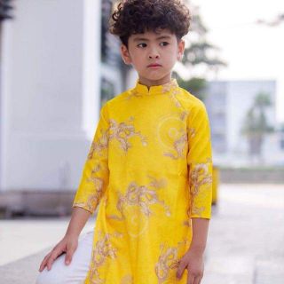 Áo dài gấm rồng bắt trân châu
