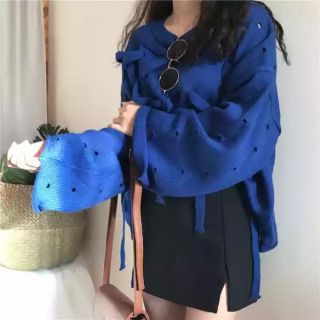 Áo len oversize đan dây thiết kế lạ