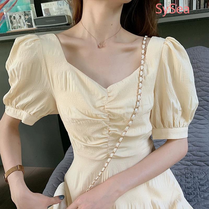 Đầm chữ A MURIOKImàu vàng nhạt tay phồng hở lưng thanh lịch phong cách Hàn Quốc cho nữ