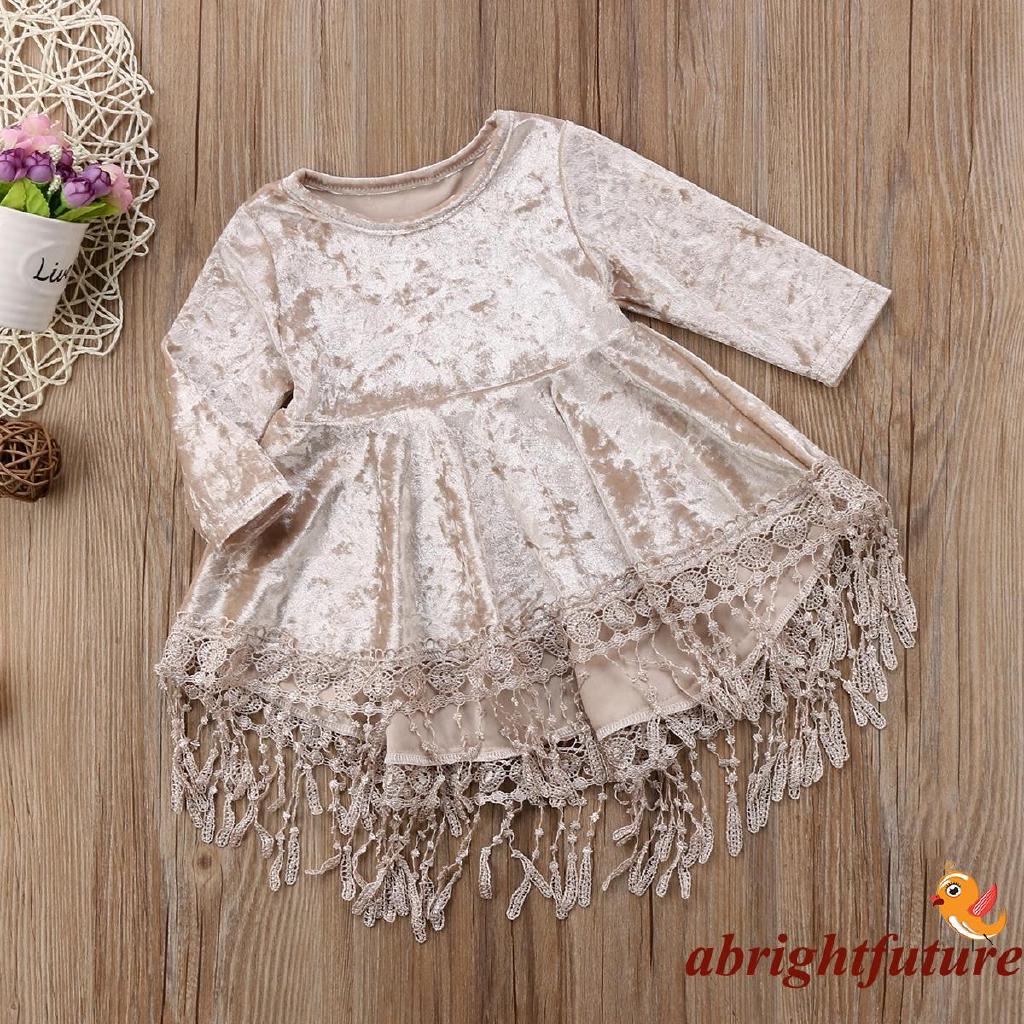 Đầm nhung thắt nơ cho bé gái