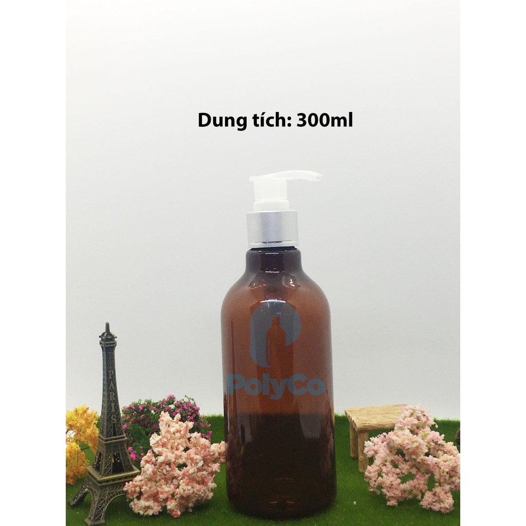 chai pet 300ml nâu nắp mỏ vịt trắng