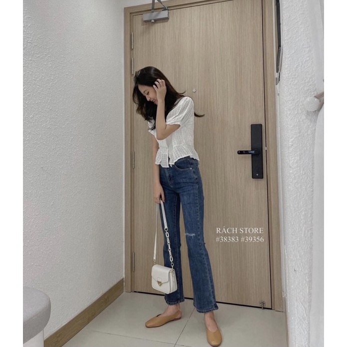 Quần jeans xanh ống loe rách gối