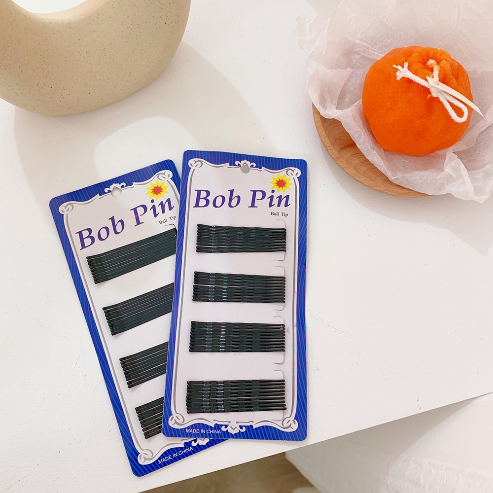 Kẹp tóc kim loại màu đen thiết kế đơn giản dễ phối đồ