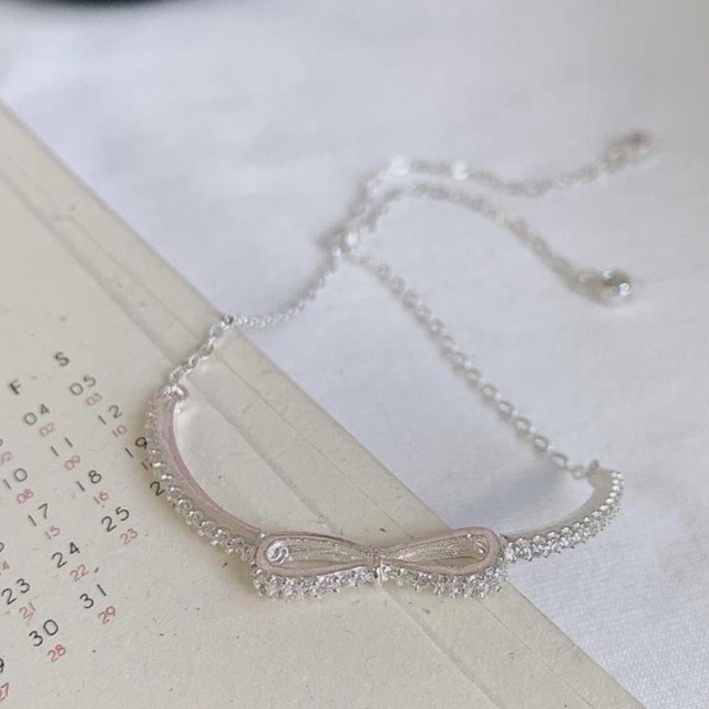 Lắc tay nữ bạc ta nơ siêu xinh, thiết kế dây rút điều chỉnh theo cỡ tay Mainomi Shop Bạc Xinh