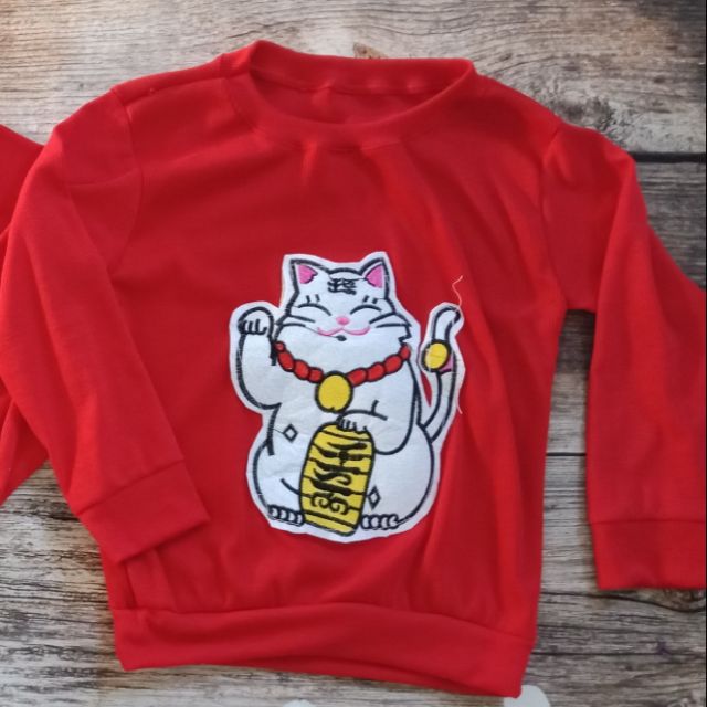 Áo len mèo thần tài cho bé