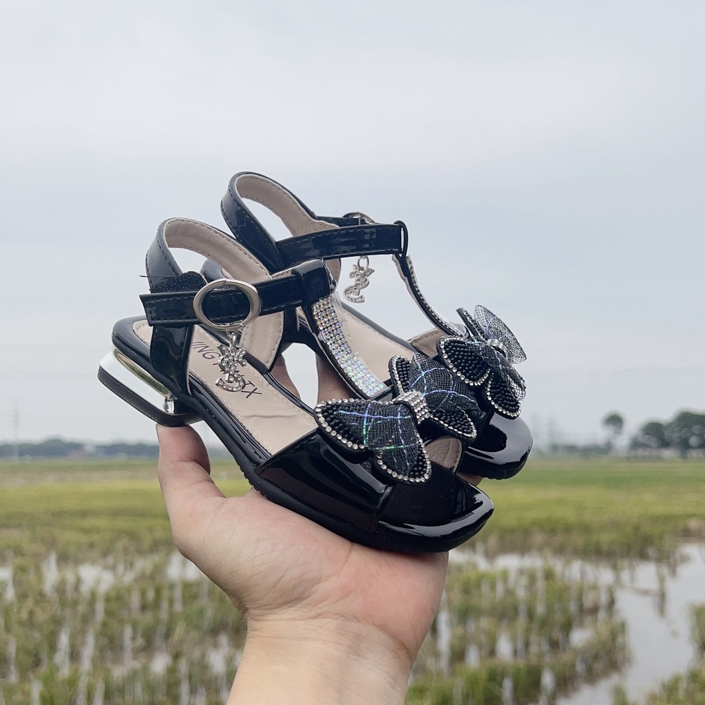 sandal cao cấp có gót cho bé gái dép quay hậu cho bé đế dẻo da bóng êm chân nơ lưới đá sng chảnh 8101
