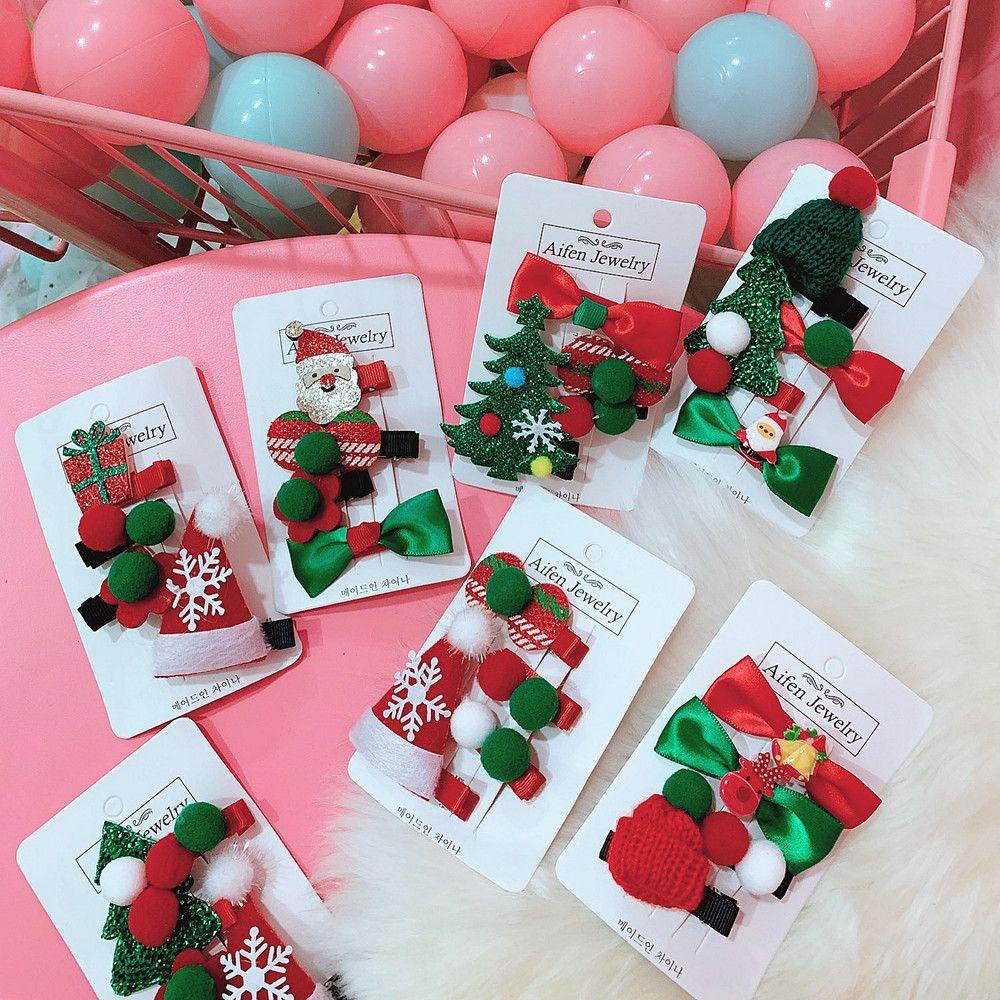 Bộ 2 / 4 Kẹp Tóc Họa Tiết Ông Già Noel Dễ Thương Cho Bé Gái