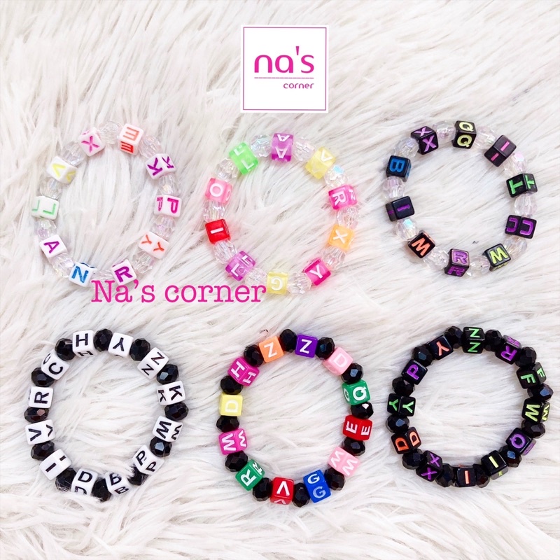 Vòng tay chữ hạt nhựa đủ màu dây cước thun