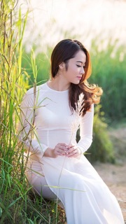 Áo dài lụa trắng tinh khôi