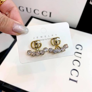 khuyên gucci đá