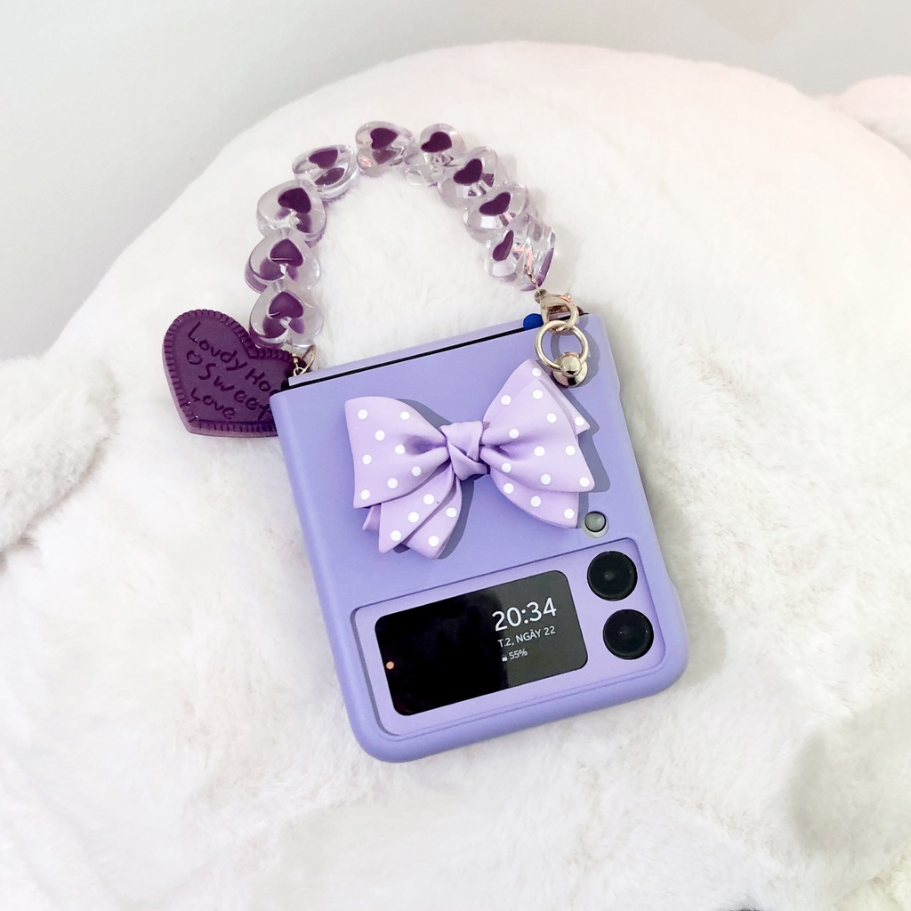 Ốp Samsung Z Flip3 / ZFlip3 / Z Flip4/ ZFlip4 đính nơ có dây xách xinh xắn (2 màu)