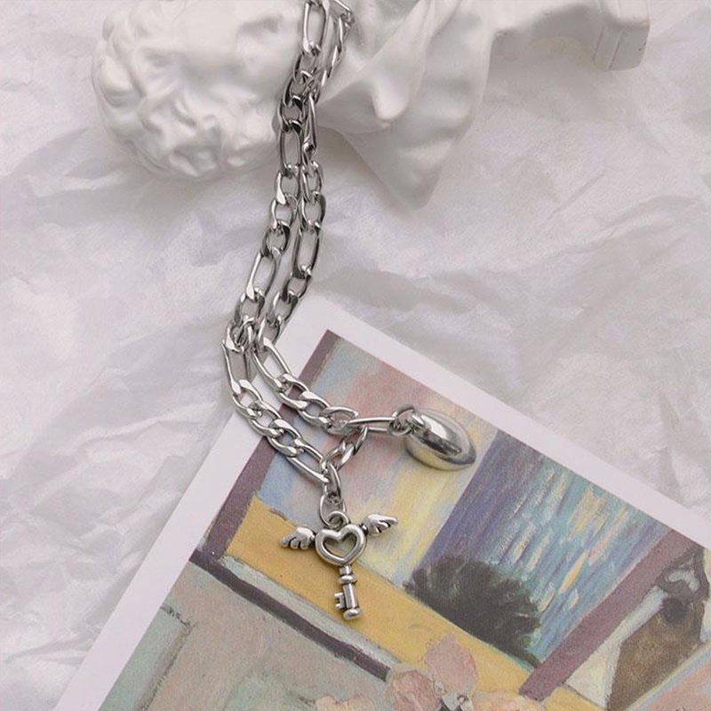 Vòng Tay Thép Titan Mặt Ổ Khóa Nam Châm Hình Trái Tim Cho Cặp Đôi