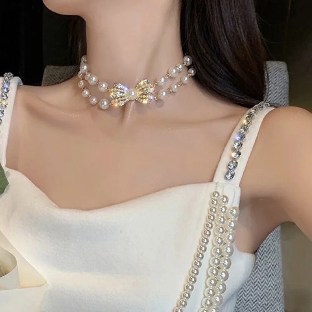 Vòng cổ choker hai lớp đính ngọc trai và nơ thời trang