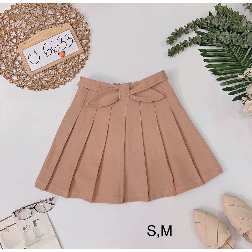 Chân váy xếp ly nơ