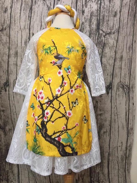 Áo dài dạng váy ren cho bé