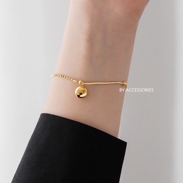 Lắc tay titan dây bi phối mặt tròn Lucky không gỉ