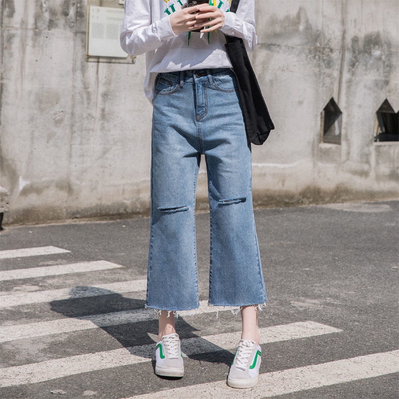 Quần jean lưng cao ống rộng phối dây xích phong cách Hàn quốc