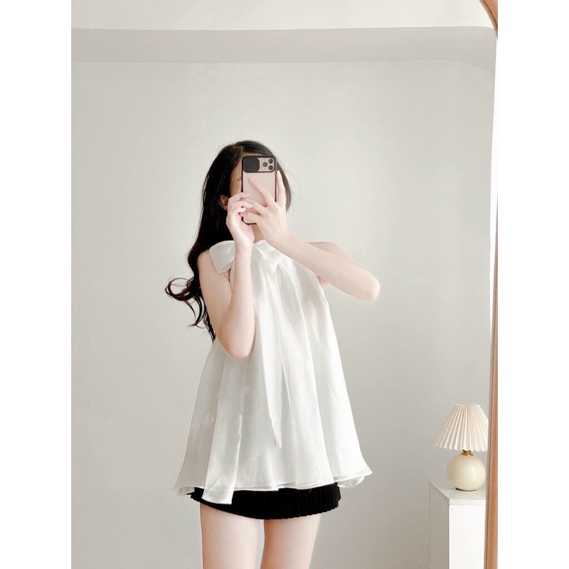 Áo trắng cổ yếm cột cơ form dấu quần , chất vải sịn sò ,dễ phối đồ cực tôn dáng ….