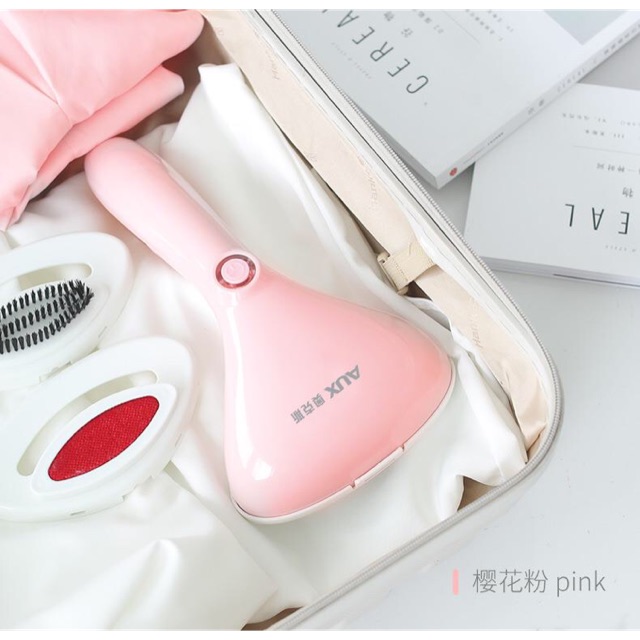Bàn là hơi nước cầm tay aux
