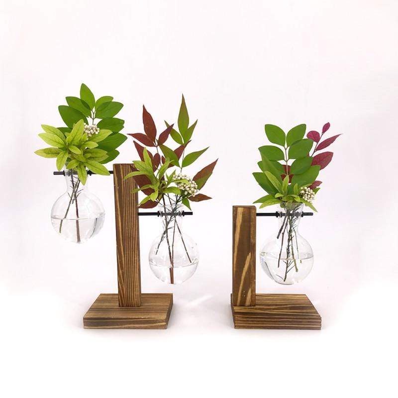 Trang trí bàn làm việc văn phòng với lọ thủy tinh cắm hoa, trồng cây kèm giá gỗ, phù hợp mọi không gian trong văn phòng