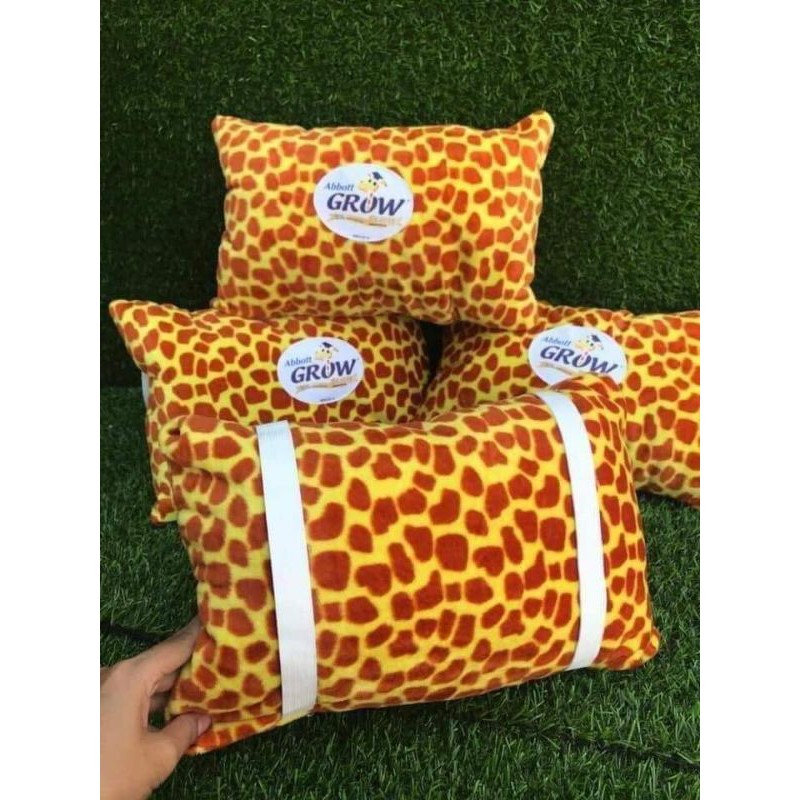 Gối đi xe máy cho bé .