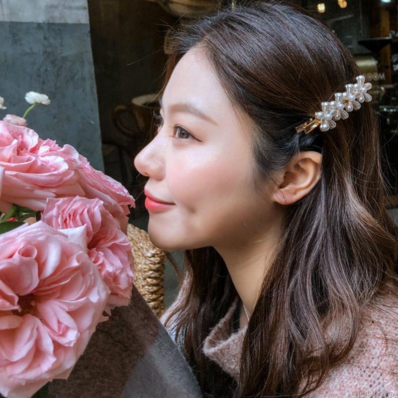 Kẹp tóc hoa dễ thương cho bé gái