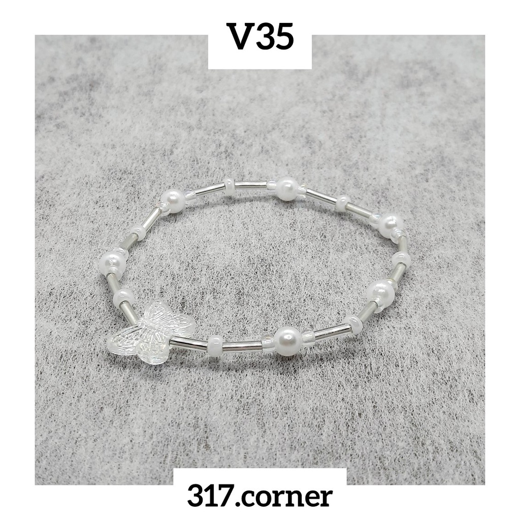 Vòng tay hạt cườm + mặt bướm hologram - V35 - 317.corner