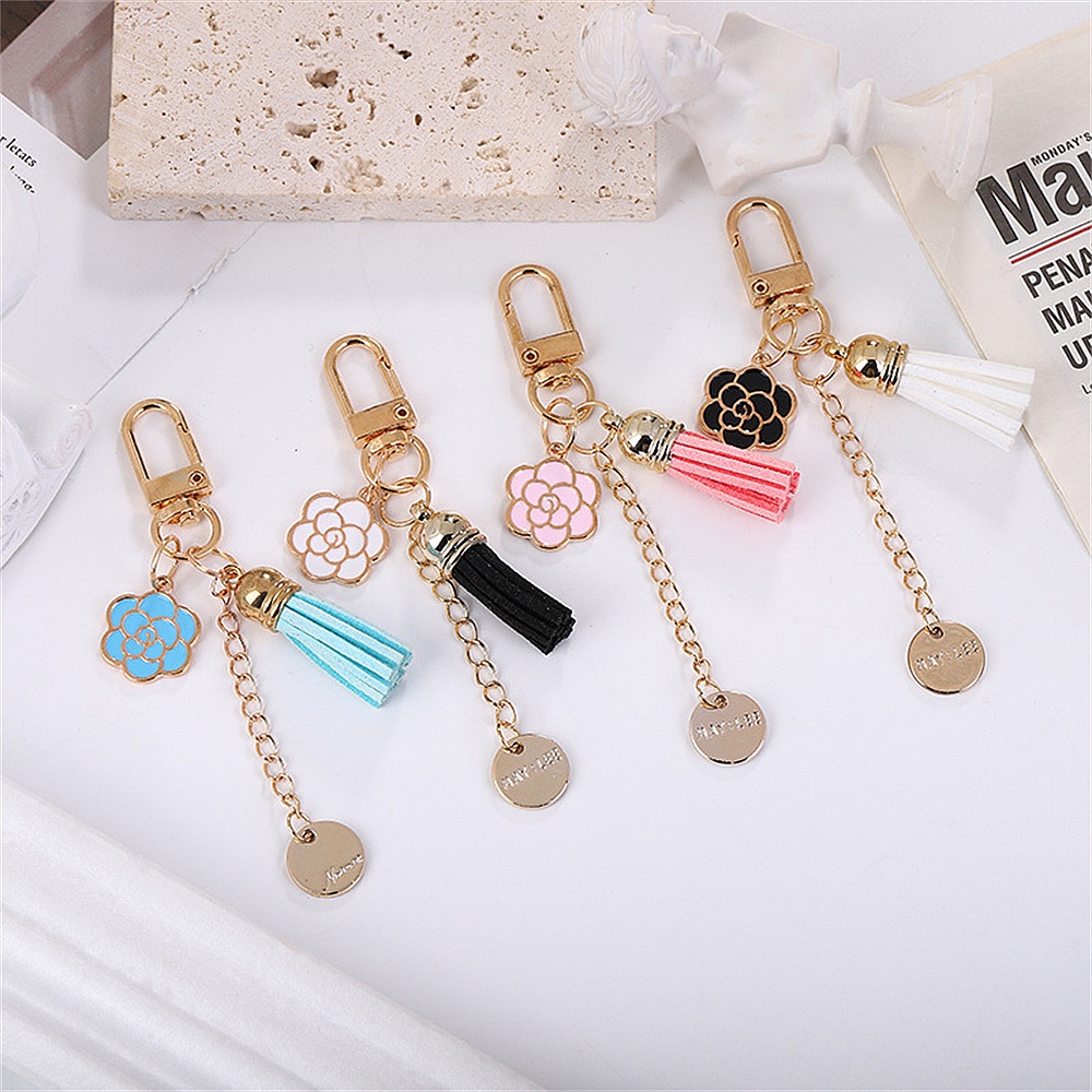 Móc Khóa Hình Bông Hoa Phối Núm Tua Thời Trang