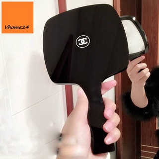 Gương cầm tay trang điểm