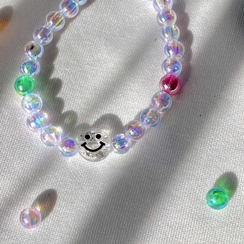 Vòng tay mặt cười hạt hologram