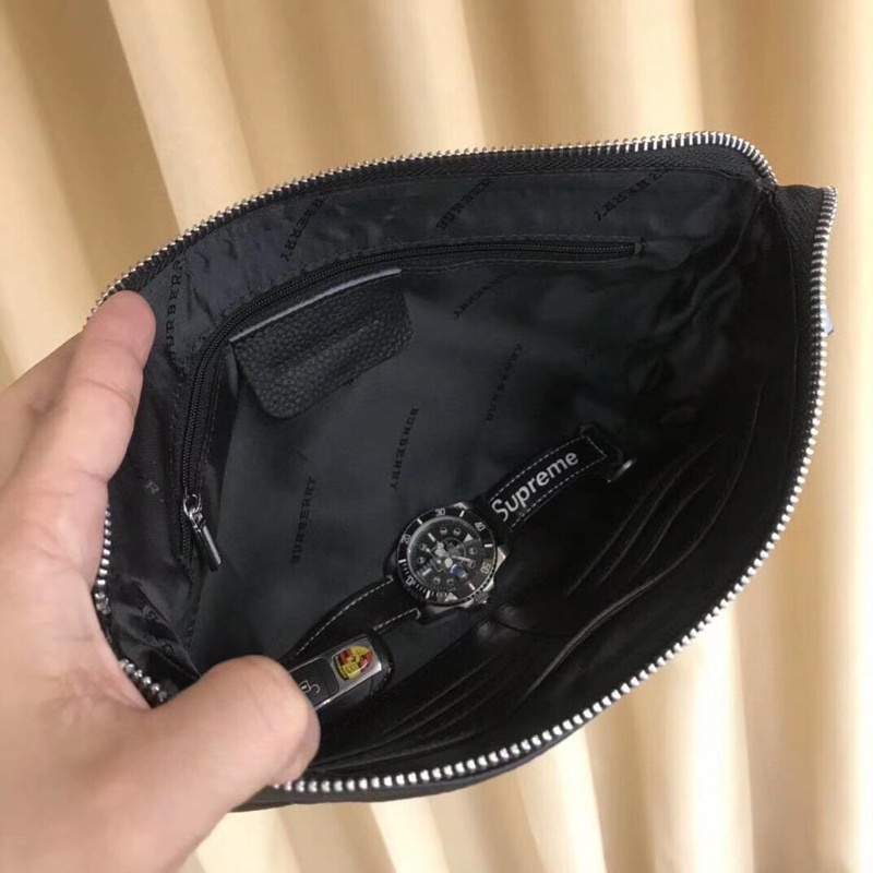 Clutch cao cấp thương hiệu Burberry da thật màu đen trơn đơn giản thời trang nam