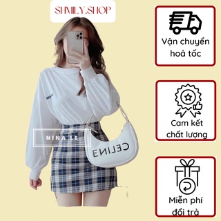 Set áo sweater trắng kèm chân váy caro