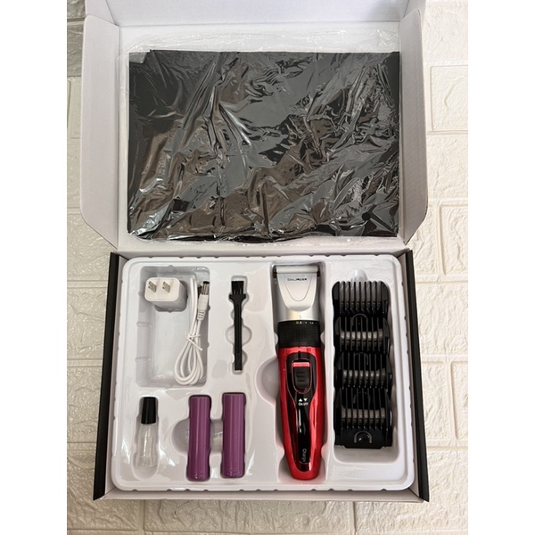 Tông đơ cắt tóc DALING 110 tặng kèm 01 pin sạc dự phòng, 1 áo choàng cắt tóc