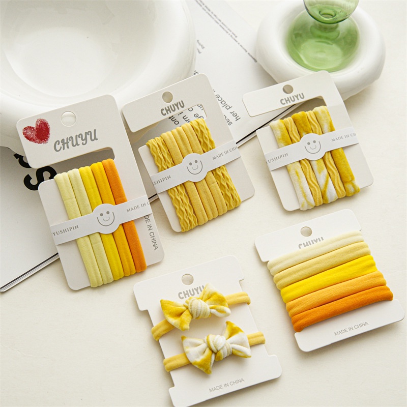 Dây Buộc Tóc Co Giãn Đính Nơ Màu Vàng Kẹo Dễ Phối Đồ Thời Trang Cho Nữ