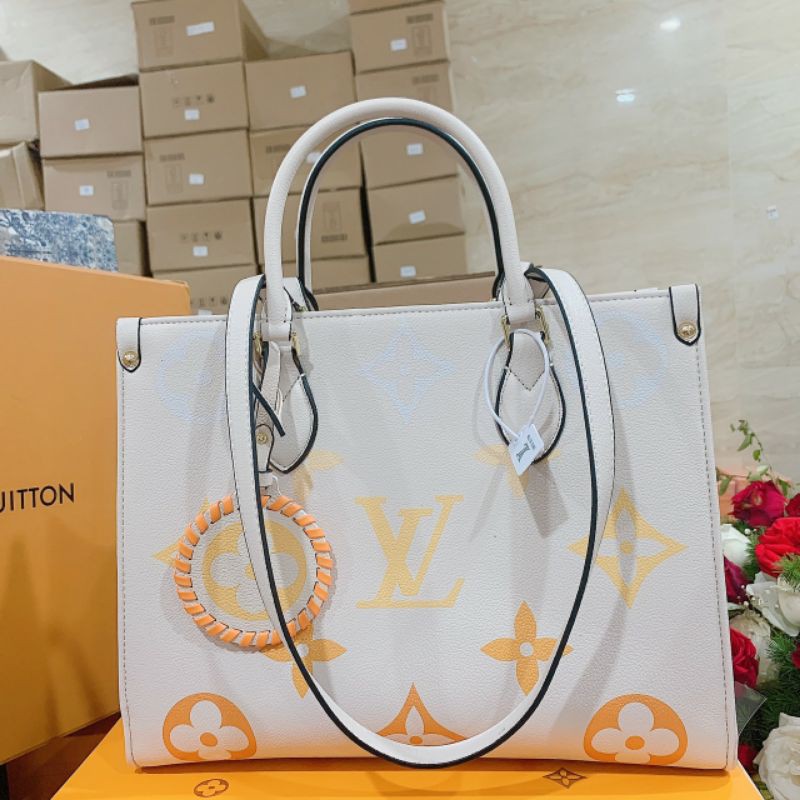 Túi LV tote on the go màu mới hồng xanh kem