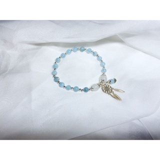 Vòng aqua mix charm