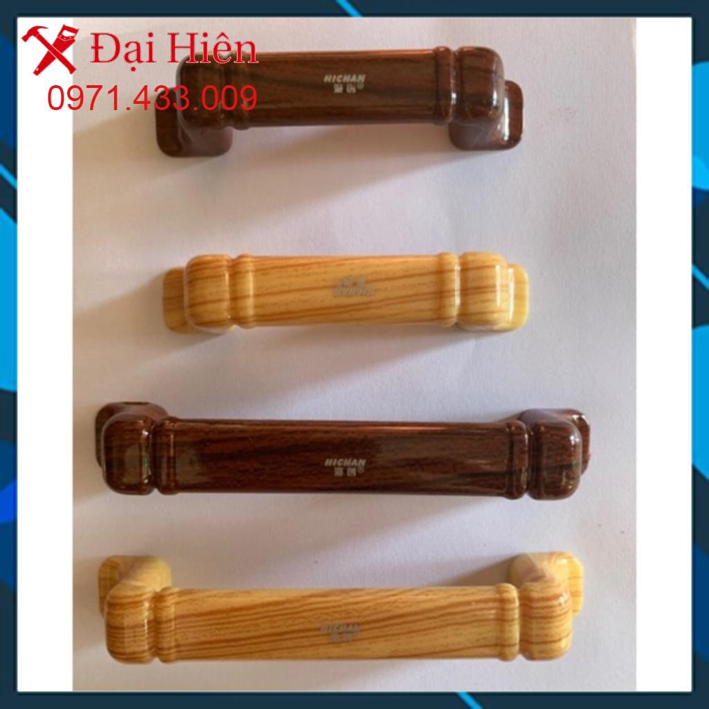 Tay nắm tủ nhựa nâu, vàng