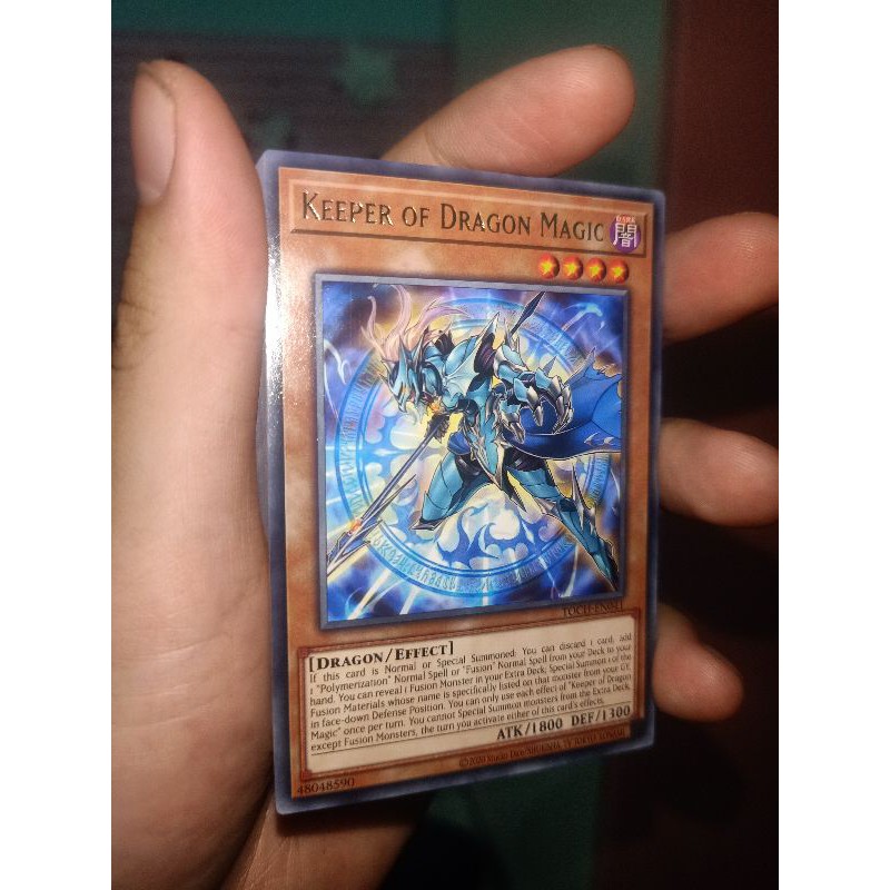 Tên thẻ bài yugioh: Keeper of Dragon Magic - TOCH-EN041 - Rare Unlimited