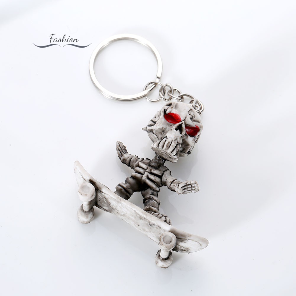 Móc khóa mặt hình bộ xương chơi ván trượt đáng yêu độc đáo treo túi xách chìa khóa xe hơi