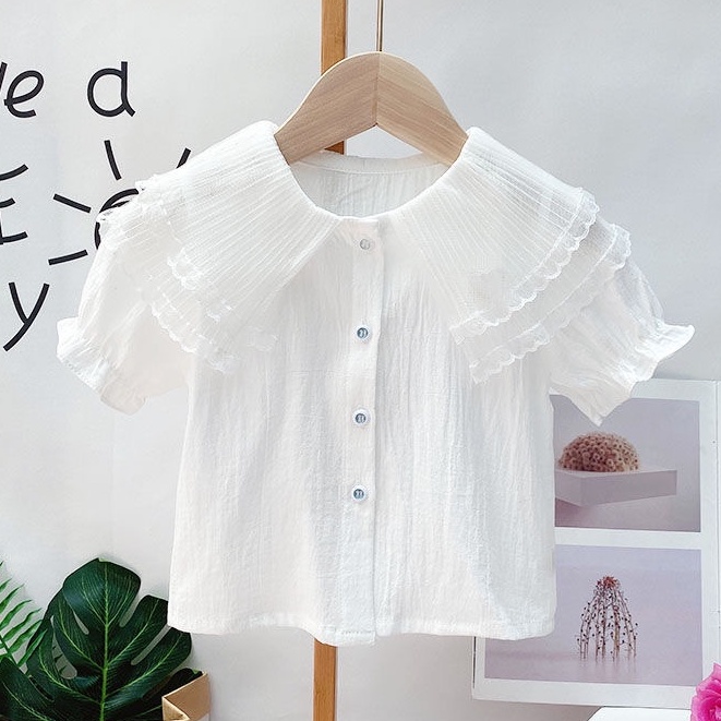 Cô gái áo sơ mi ngắn tay màu sắc ngắn tay áo sơ mi