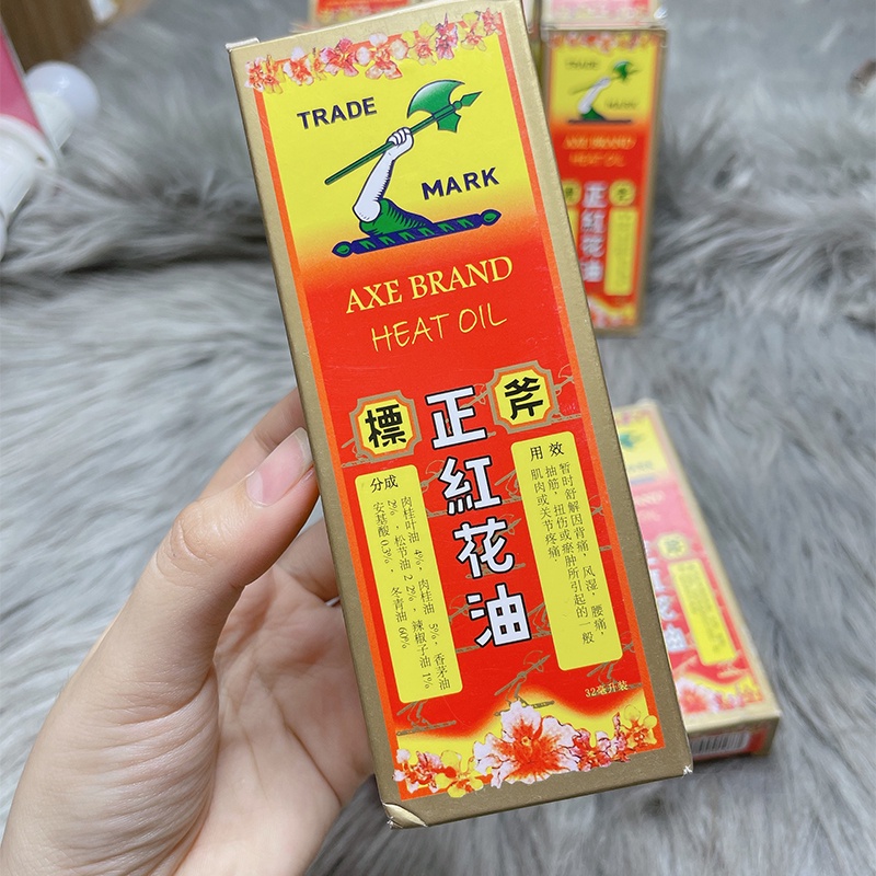 Dầu gió Hồng Hoa hiệu cây búa , đau nhức cơ , bong gân , thấp khớp , bầm tím , massage body singapore 32ml
